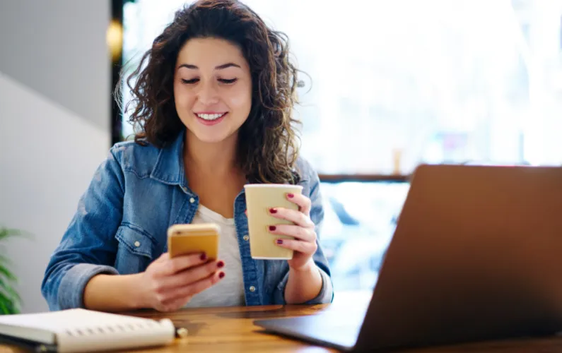 woman working on her service baed website