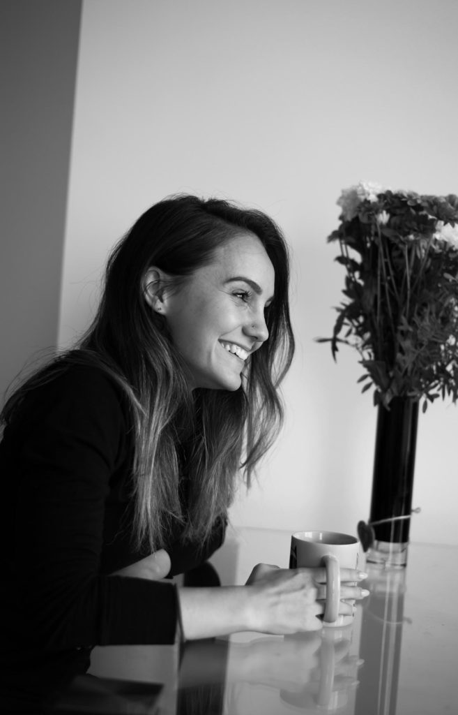 woman smiling working on ugc